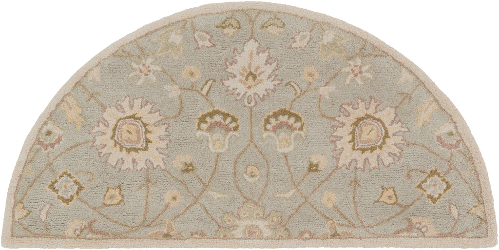Giardino Stone half-round hand-tufted wool rug with a floral pattern in blue-grey and beige.