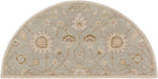Giardino Stone half-round hand-tufted wool rug with a floral pattern in blue-grey and beige.