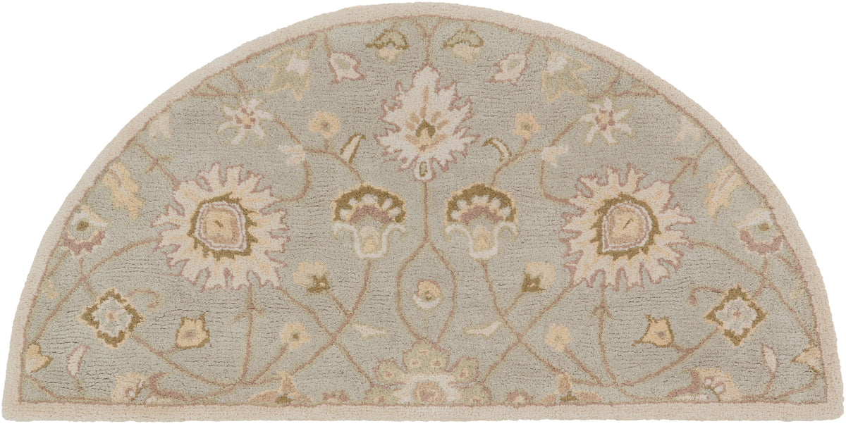 Giardino Stone half-round hand-tufted wool rug with a floral pattern in blue-grey and beige.