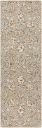 Giardino Stone hand-tufted wool runner rug with a floral pattern in blue-grey, beige, and ivory.