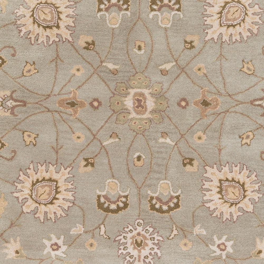 Giardino Stone hand-tufted wool rug with a blue-grey floral pattern