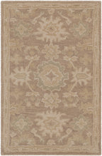 Julian Sand hand-tufted wool rug with a warm beige floral and medallion pattern.