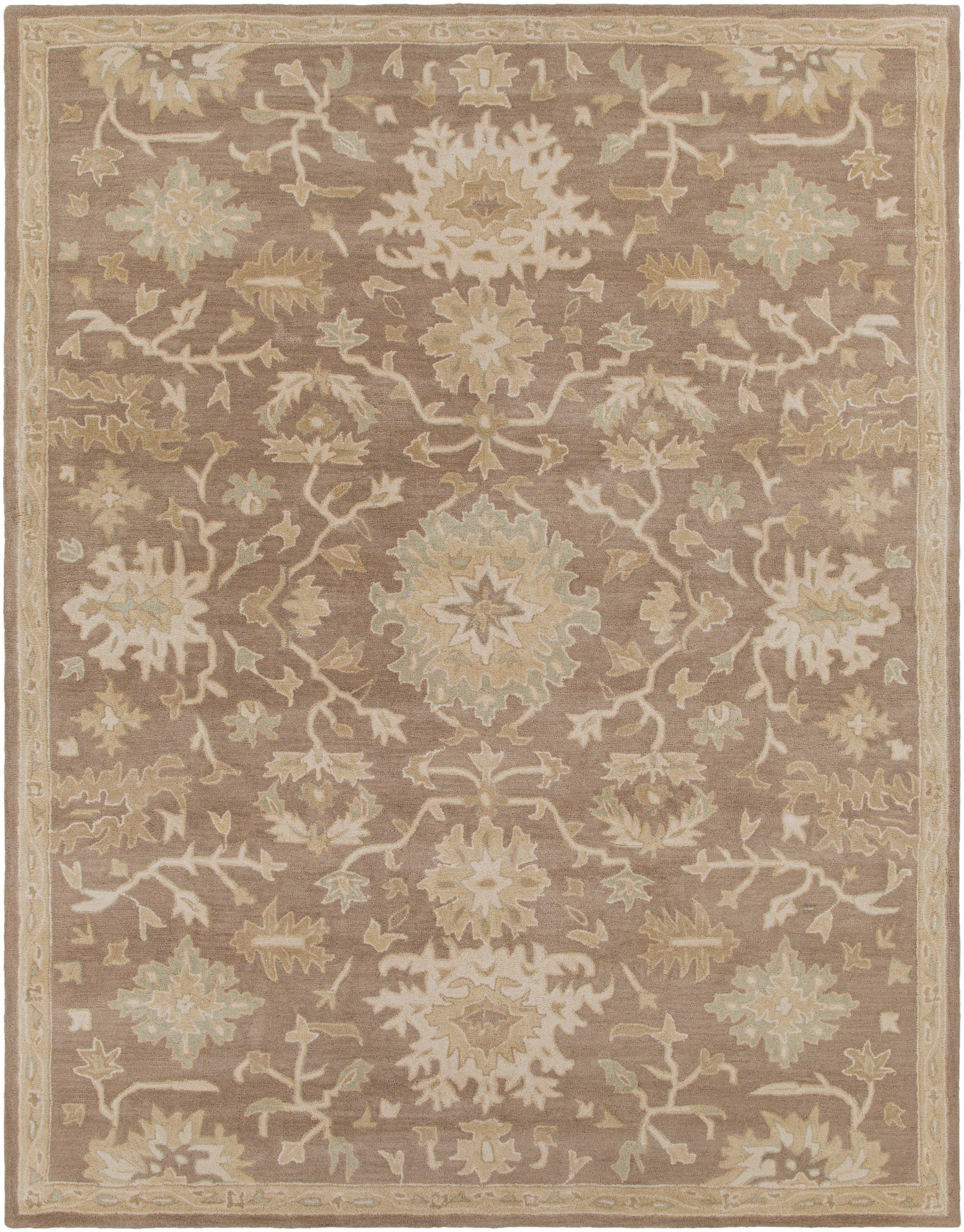 Julian Sand hand-tufted wool rug with a warm sand-colored traditional floral pattern.