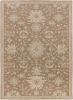 Julian Sand hand-tufted wool rug with traditional floral patterns in warm beige and cream tones.