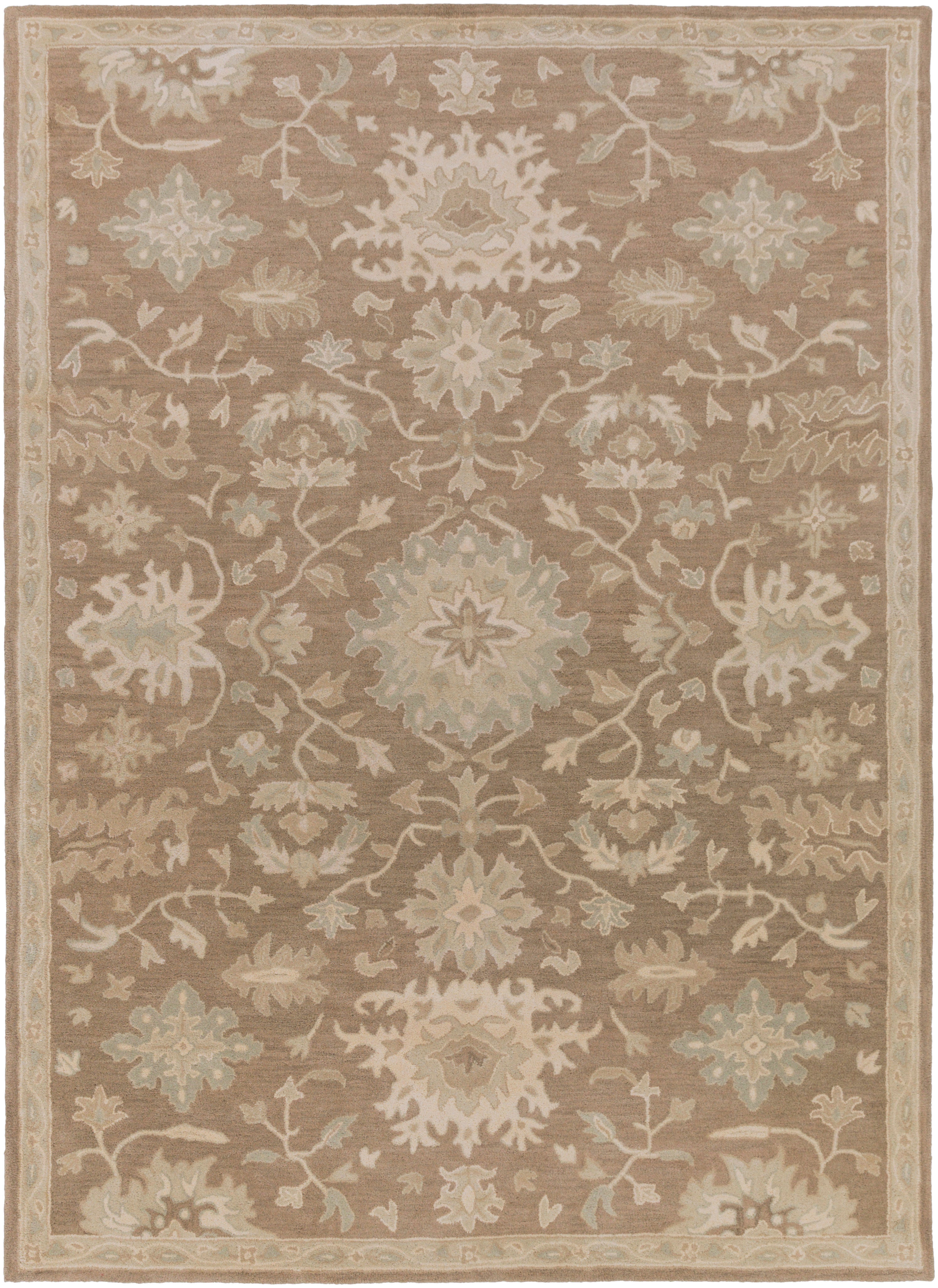 Julian Sand hand-tufted wool rug with traditional floral patterns in warm beige and cream tones.