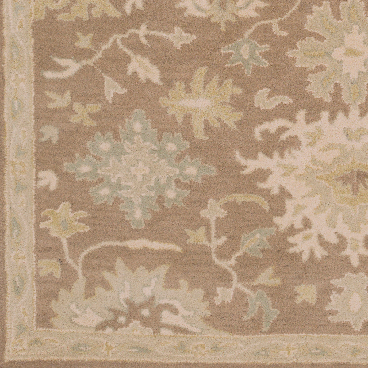 Julian Sand hand-tufted wool rug with a warm beige floral and vine pattern.