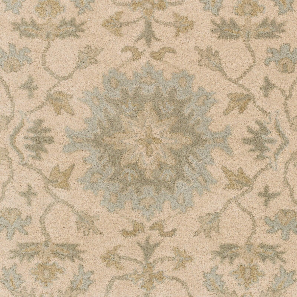 Julian Natural Hand-Tufted wool rug with beige, sage green, and tan floral medallion patterns.