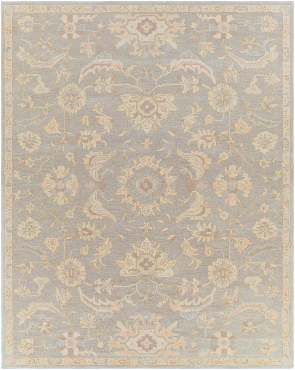Julian Arctic hand-tufted wool rug featuring a muted blue and beige floral pattern.