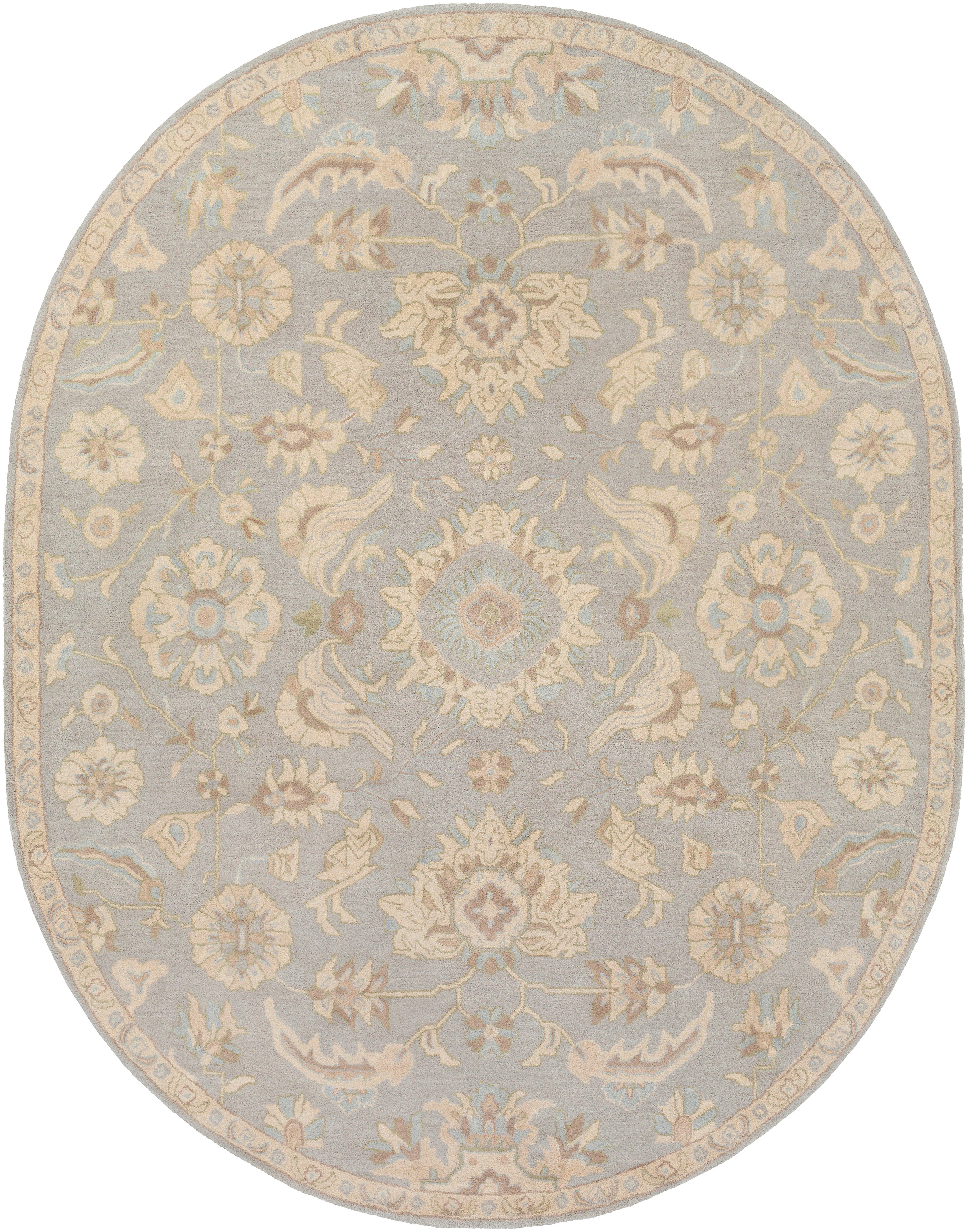 Oval Julian Arctic hand-tufted wool rug with light blue and beige floral patterns.