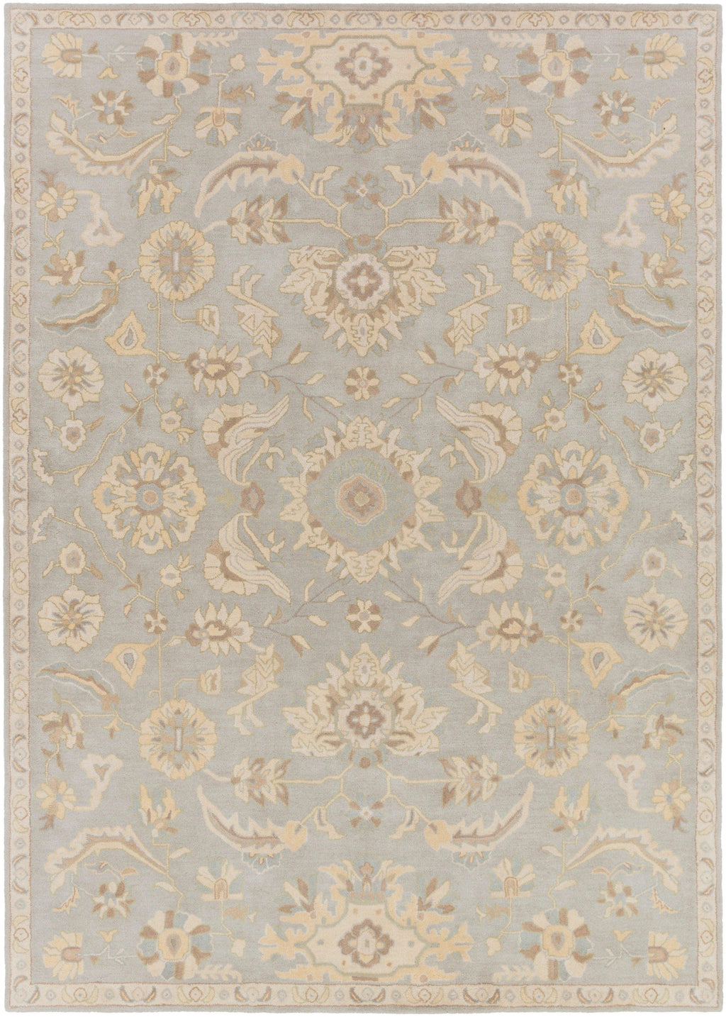 Julian Arctic hand-tufted wool rug featuring a light blue field with beige floral patterns.