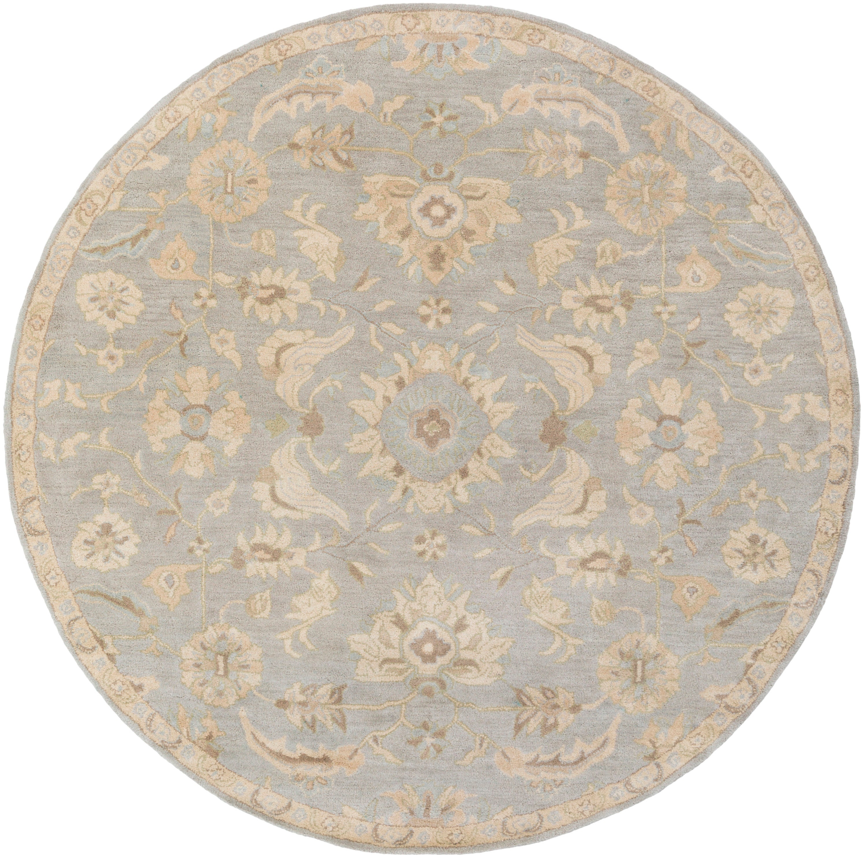 Julian Arctic round wool rug with blue and beige floral patterns