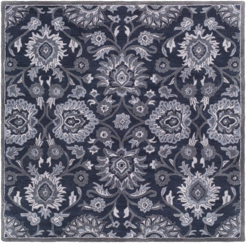 Mediterranean Ocean hand-tufted wool rug featuring a floral pattern in charcoal, slate, and denim.
