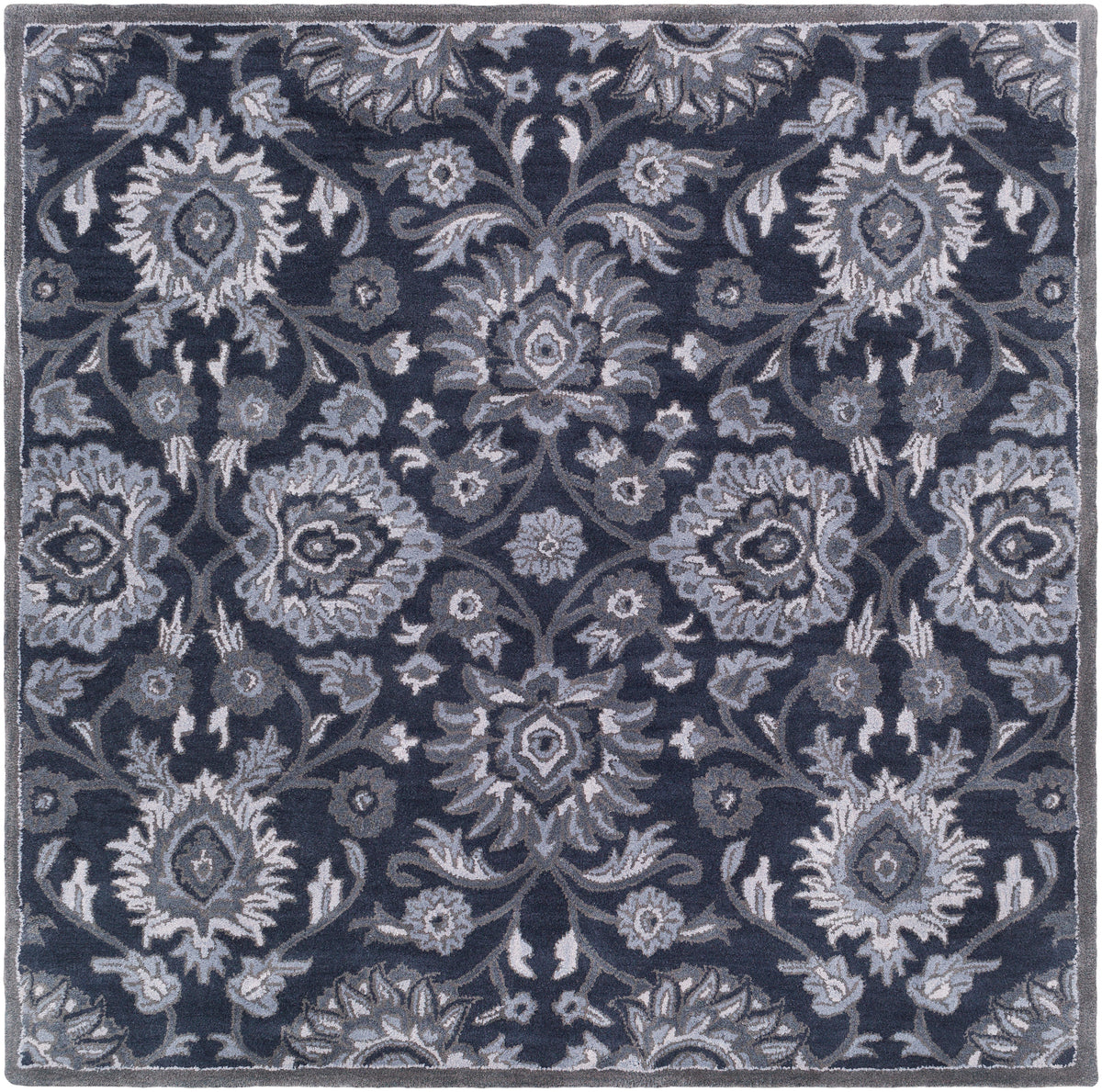 Mediterranean Ocean hand-tufted wool rug featuring a floral pattern in charcoal, slate, and denim.