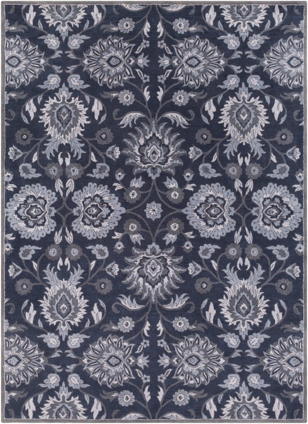 Mediterranean Ocean hand-tufted wool rug featuring a floral pattern in charcoal, slate, and denim.