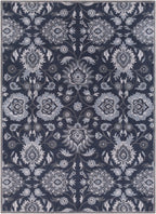 Mediterranean Ocean hand-tufted wool rug featuring a floral pattern in charcoal, slate, and denim.