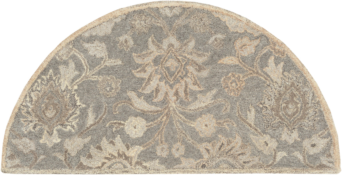 Half-round Mediterranean Seal hand-tufted wool rug with grey, taupe, and ivory floral patterns.