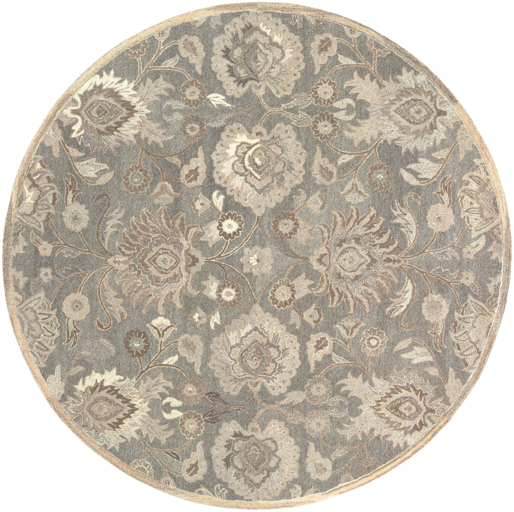 Round Mediterranean Seal hand-tufted wool rug with grey, taupe, and ivory floral patterns.