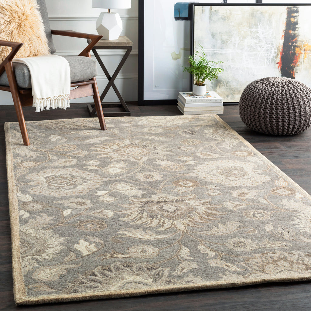 Mediterranean Seal hand-tufted wool rug with a grey and ivory floral pattern in a living room setting.