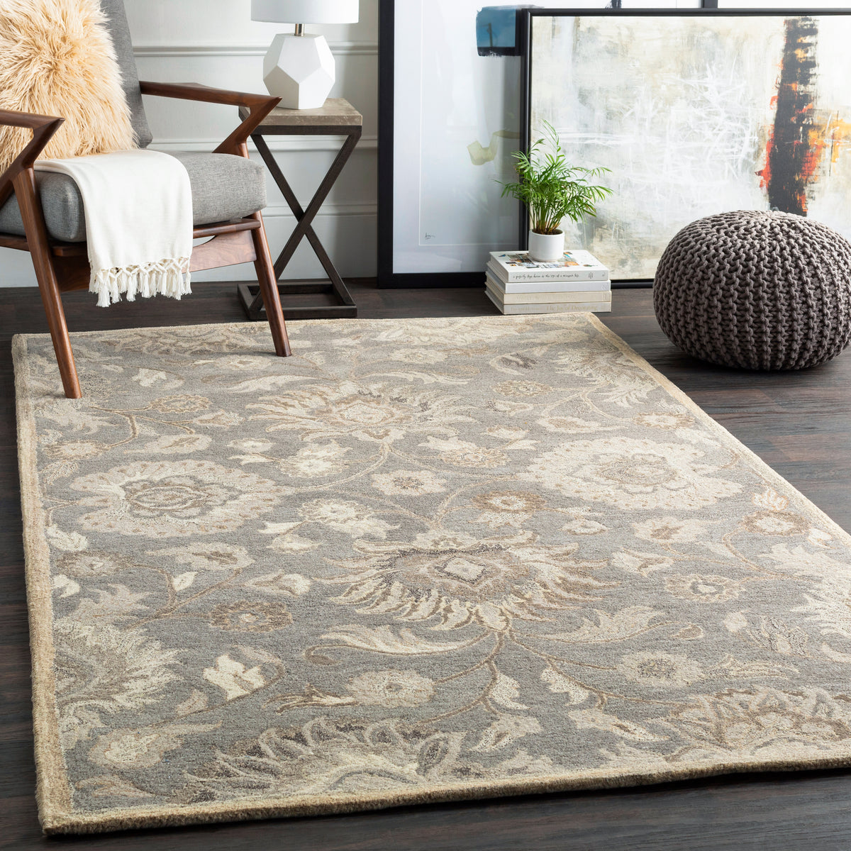 Mediterranean Seal hand-tufted wool rug with a grey and ivory floral pattern in a living room setting.