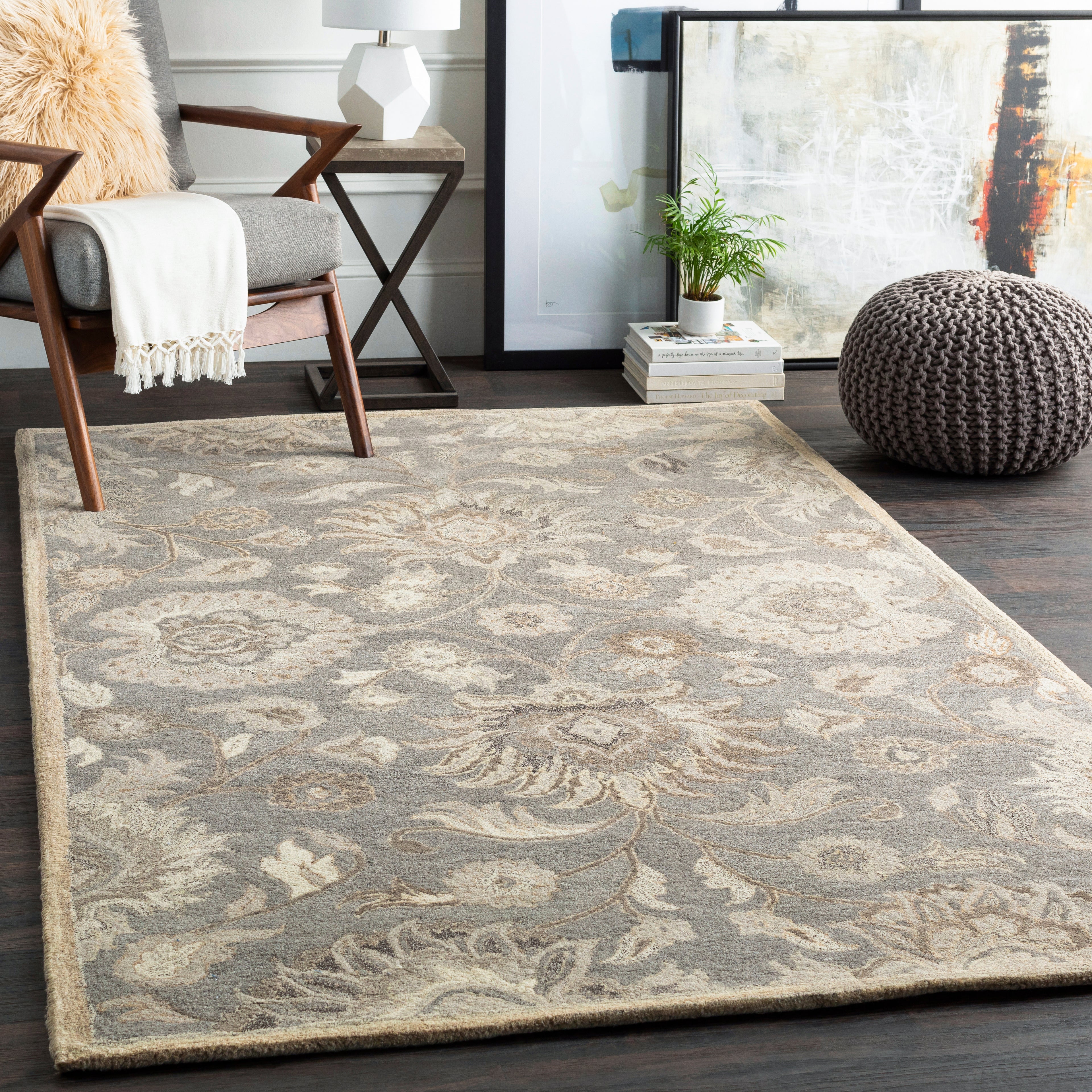 Mediterranean Seal hand-tufted wool rug with a grey and ivory floral pattern in a living room setting.
