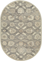 Oval Rubicon Oyster wool rug with a grey and beige floral pattern.