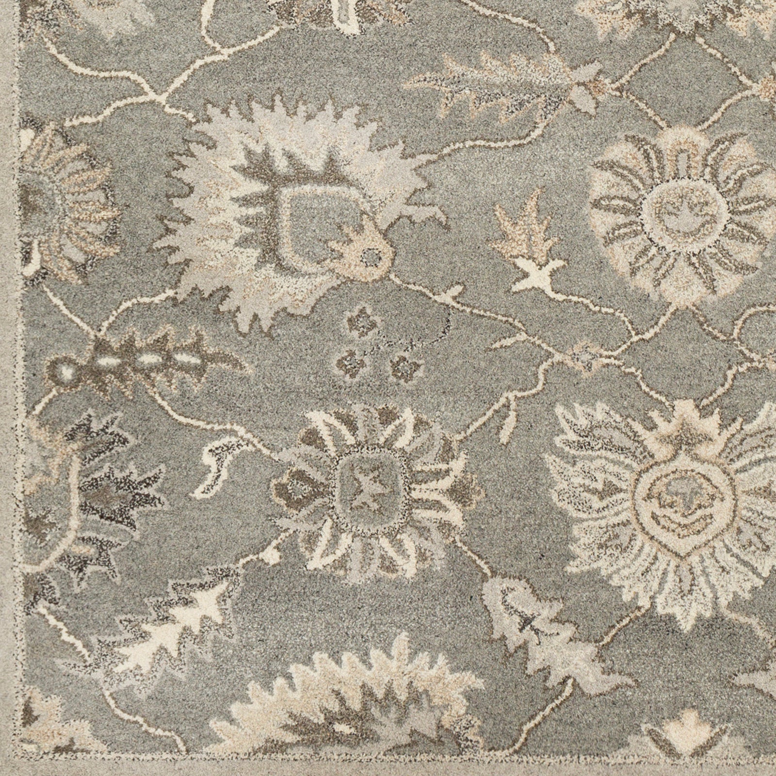 Rubicon Oyster hand-tufted wool rug with floral patterns in grey, beige, and ivory.