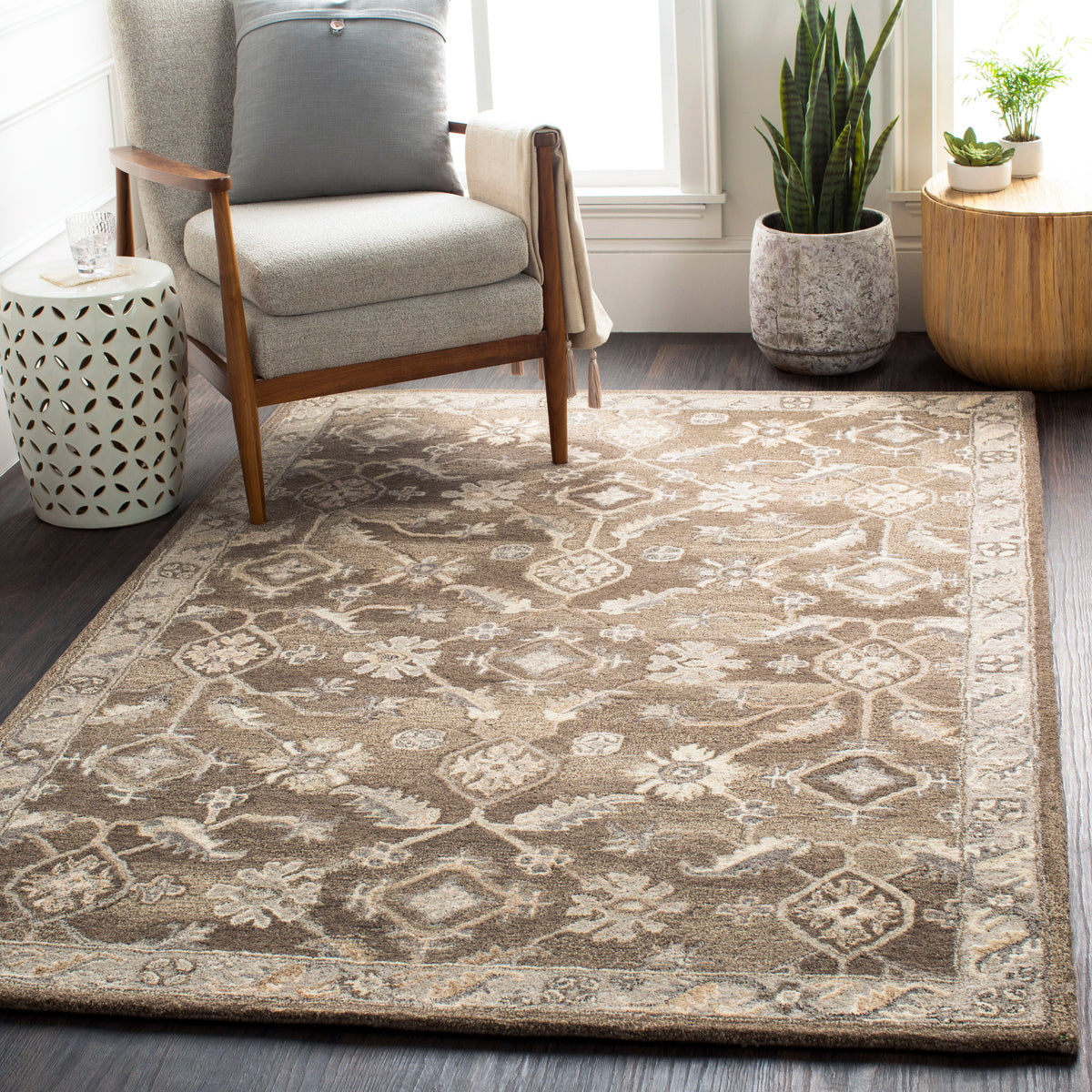 Euphrates Mocha Hand-Tufted Rug with a brown and beige traditional floral pattern in a living room.