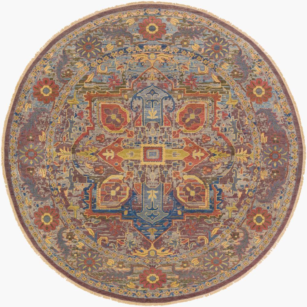 Round Cappadocia hand-knotted wool rug with traditional Turkish patterns in rich jewel tones.