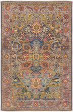 Cappadocia hand-knotted wool rug with traditional Turkish patterns in blue, red, and gold.