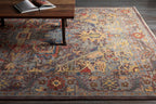 Cappadocia hand-knotted wool rug with traditional Turkish patterns in rich jewel tones.