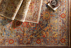 Cappadocia hand-knotted wool rug with traditional Turkish design in vibrant blue, red, and gold jewel tones.