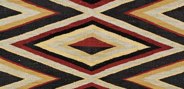 Ramah Southwest flat weave wool rug featuring a geometric diamond pattern in red, black, and beige.
