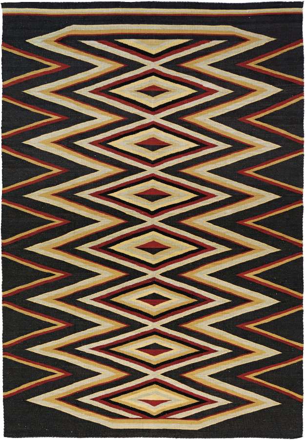 Ramah Southwest flat-weave wool rug with black, red, and beige geometric diamond patterns.