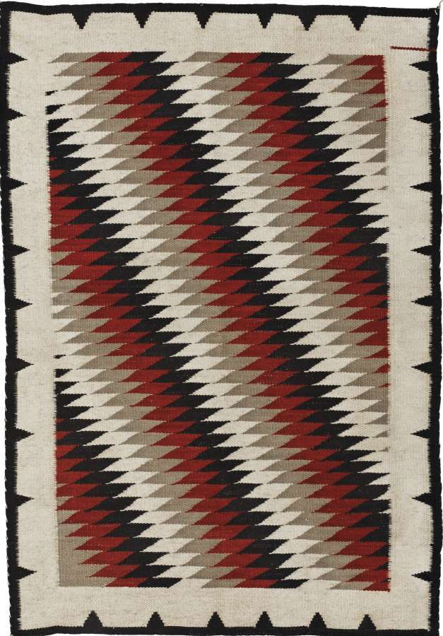 Dazzler Southwest flat weave wool rug with red, black, and grey geometric Navajo design.