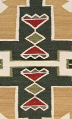 Teec Nos Pos Southwest wool rug with geometric Navajo-inspired patterns in green, tan, and red.