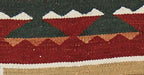 Teec Nos Pos Southwest flat-weave wool rug with red, green, and beige geometric patterns.