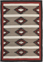 Crystal Southwest flat-weave wool rug with grey, red, and black Navajo-style geometric patterns.