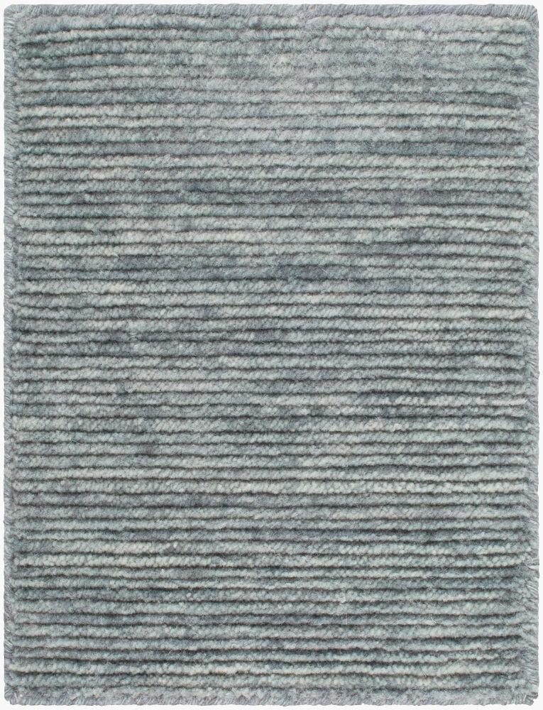 El Corte hand-loomed wool rug in textured grey and blue ribbed stripes.