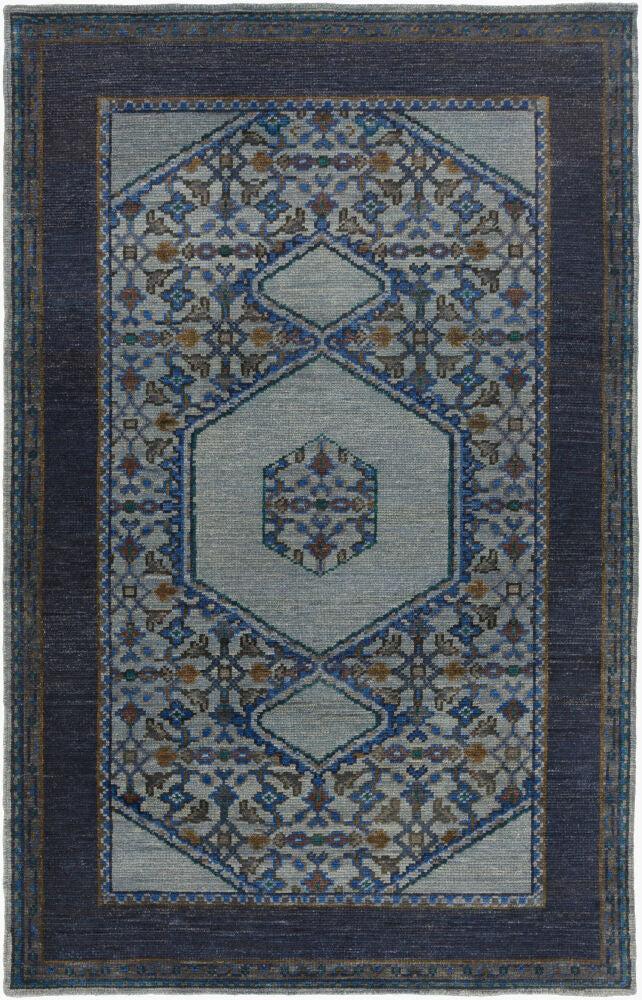 Haven Hand-Knotted wool rug with blue and grey traditional geometric patterns and a dark border.