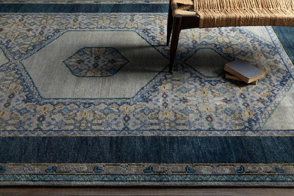 Haven Hand-Knotted Rug in blue and grey wool with traditional geometric patterns.