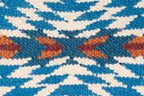 Pendleton Pagosa Springs flat-weave wool rug with blue, cream, and orange Southwest pattern.