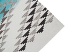 Pendleton Salt Creek turquoise and grey Southwest wool flat-weave rug corner.