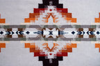 Pendleton Juniper Mesa flat-weave wool rug with orange and grey Southwest pattern.