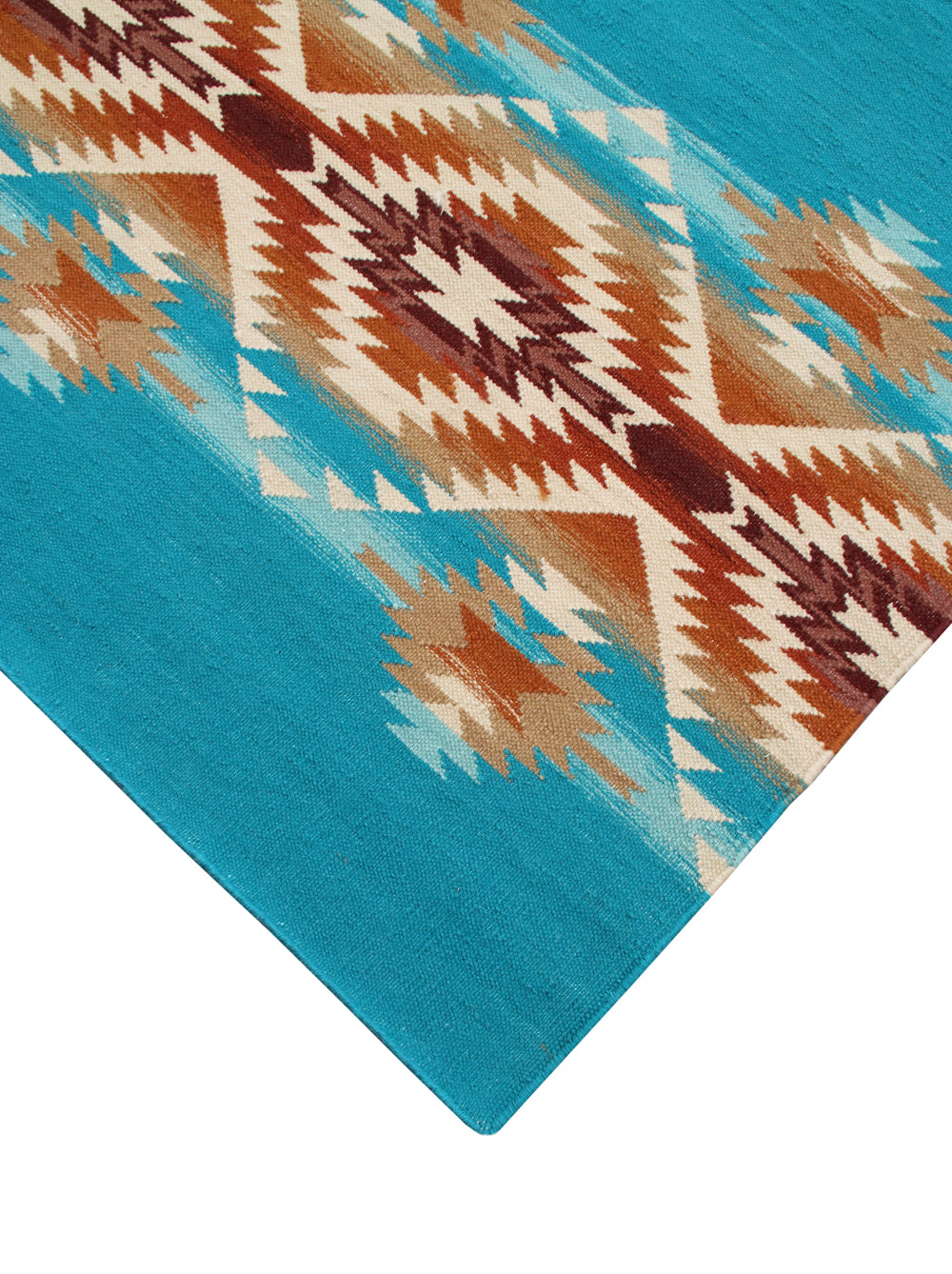 Pendleton Pagosa Springs wool flat-weave rug with turquoise and southwest geometric patterns.