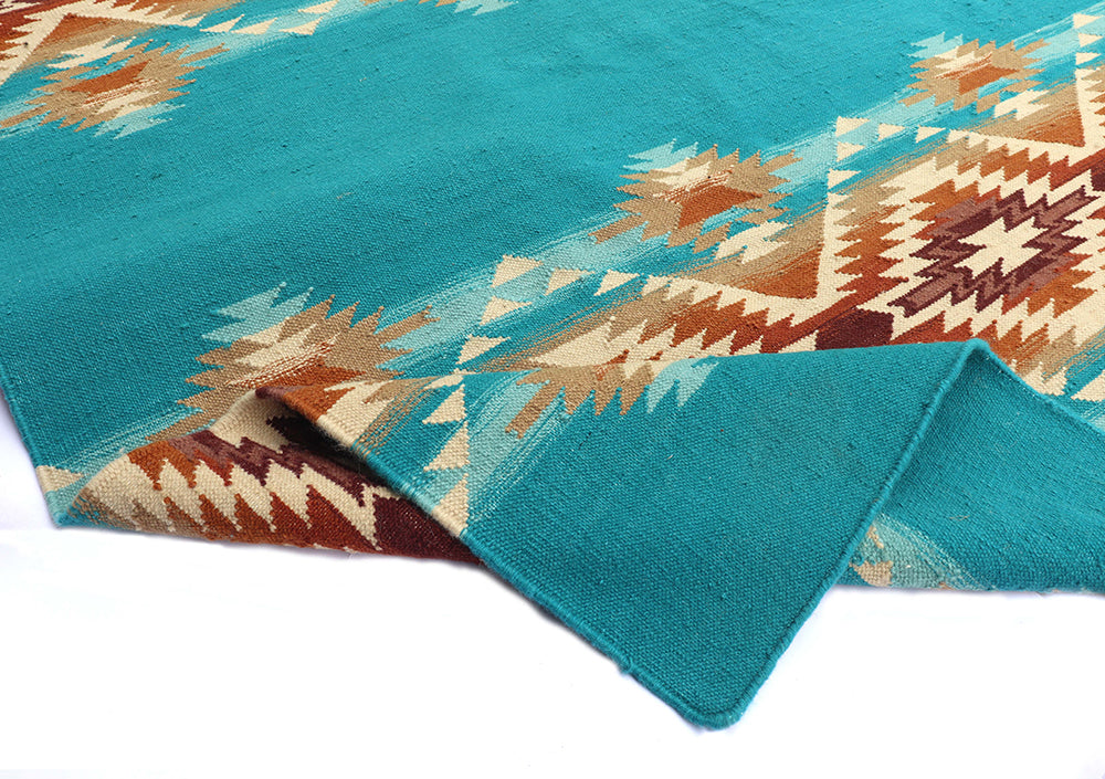 Pendleton Pagosa Springs turquoise wool flat-weave rug with Southwest geometric patterns