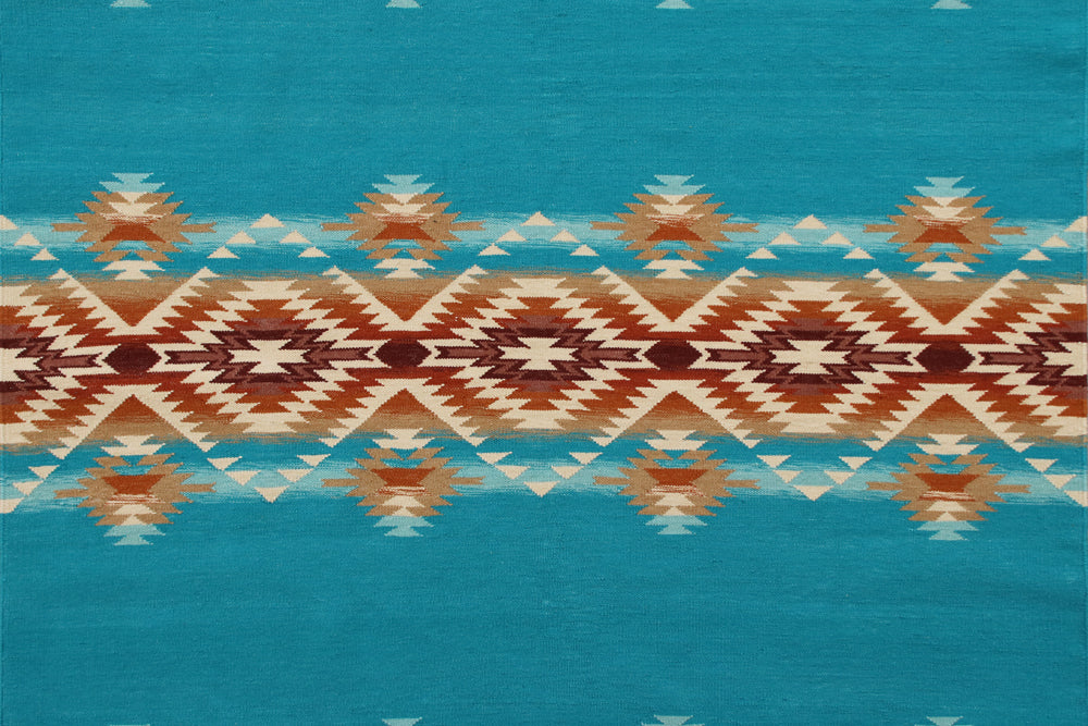 Pendleton Pagosa Springs turquoise wool rug with Southwest geometric patterns.