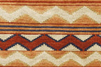 Pendleton Mesa hand-knotted wool rug with terra cotta, ivory, and blue Southwest geometric patterns.