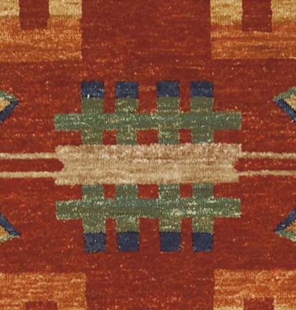 Pendleton Anasazi Southwest wool rug with terra cotta, green, and beige geometric patterns.