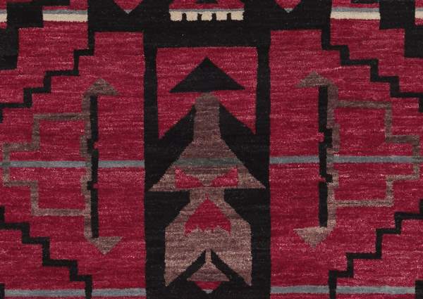 Pendleton Storm Cardinal Southwest hand-knotted wool rug in red, black, and gray geometric patterns.
