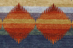 Pendleton Southwest hand-knotted wool rug with terra cotta diamond pattern on blue and gold stripes